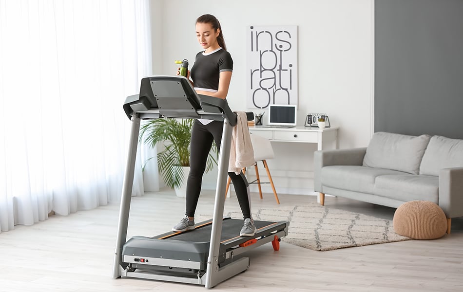 woman training on treadmill