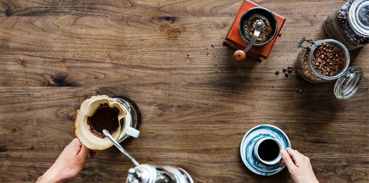 person making coffee