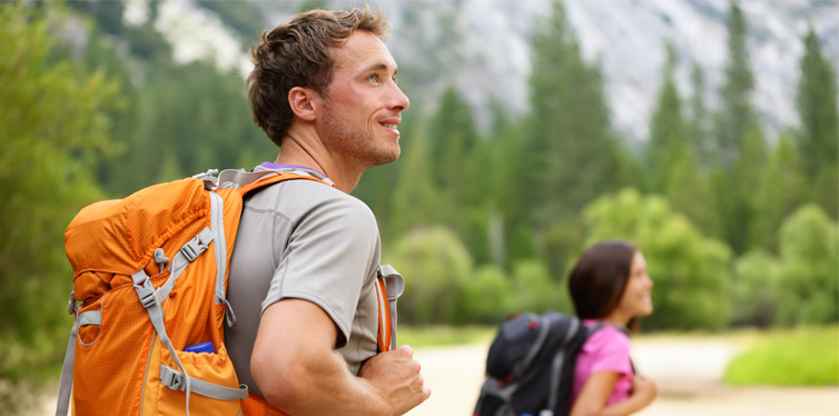guy and a girl with backpacks