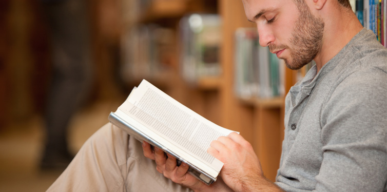 man reading a book