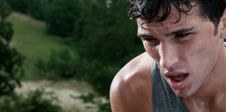 man sweating after running