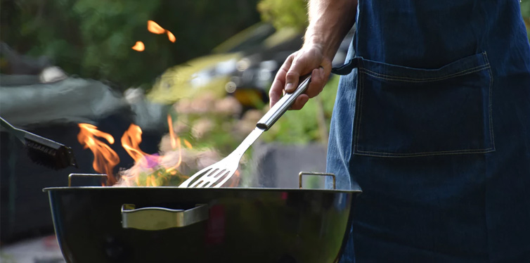 man using grill