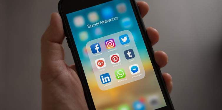 phone with social media icons