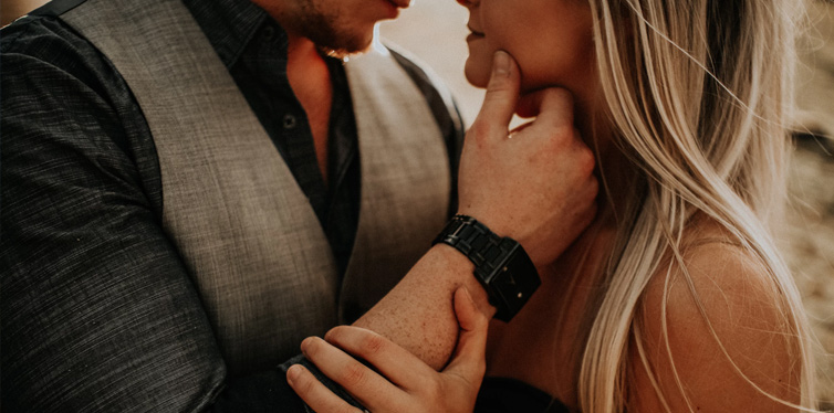 man kissing the girl