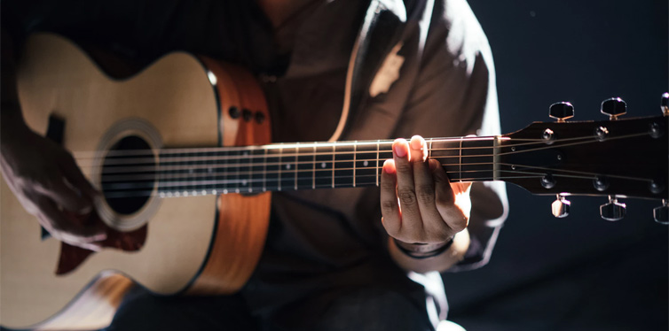 man playing guitar