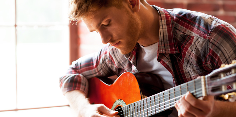 man playing guitar