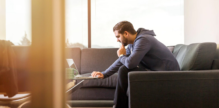 man working with laptop