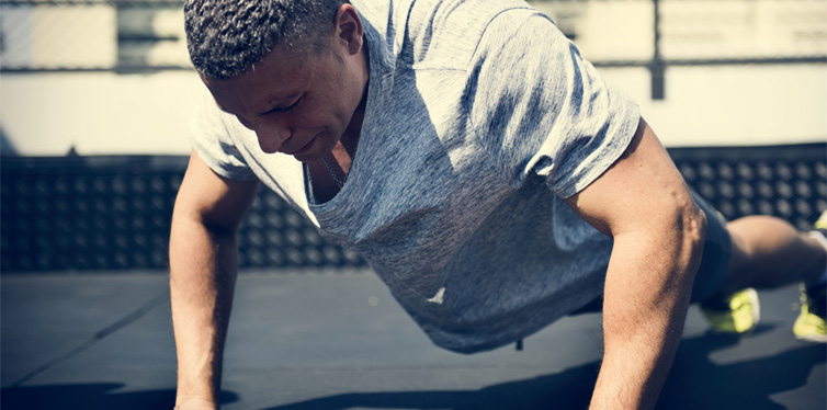 man doing burpees