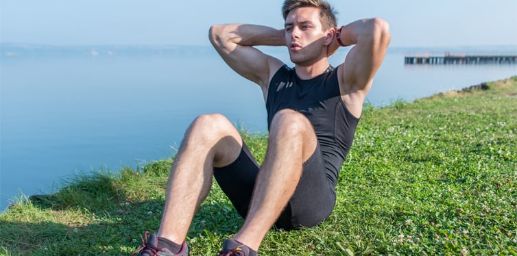 man doing crunches