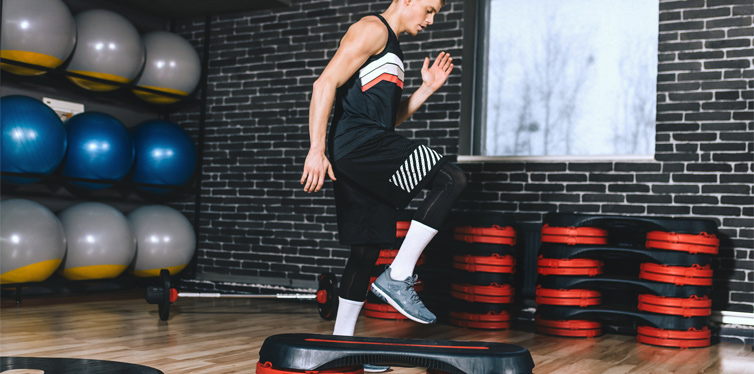 man doing step-up jumps