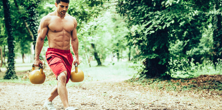 man doing weighted lunges