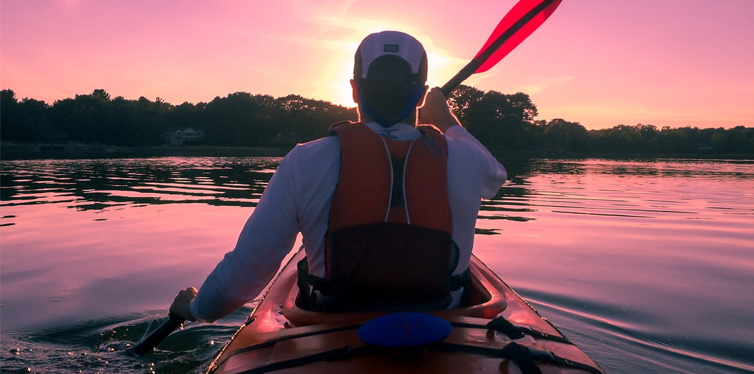 man in kayak boat
