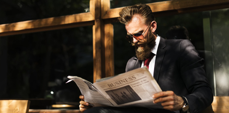 man reading newspaper