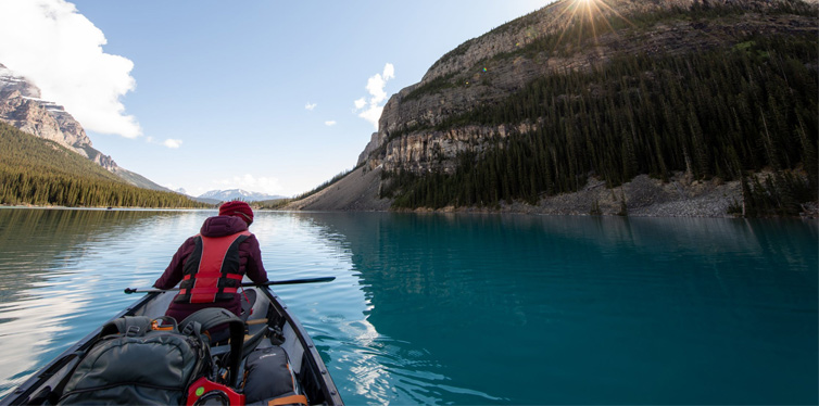person in a kayak boat