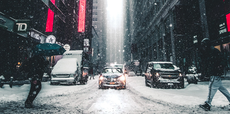 person walking on the street during day time