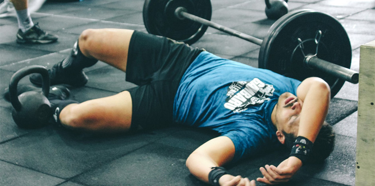 man tired at the gym