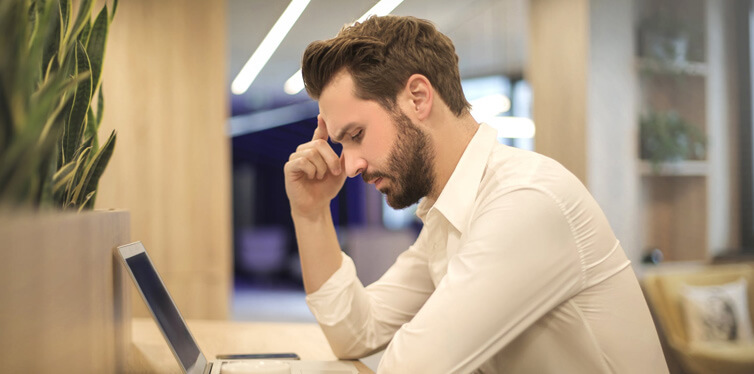 young businessman with headache