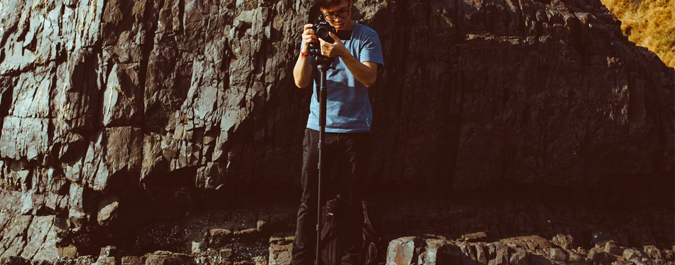 a photographer using a monopod