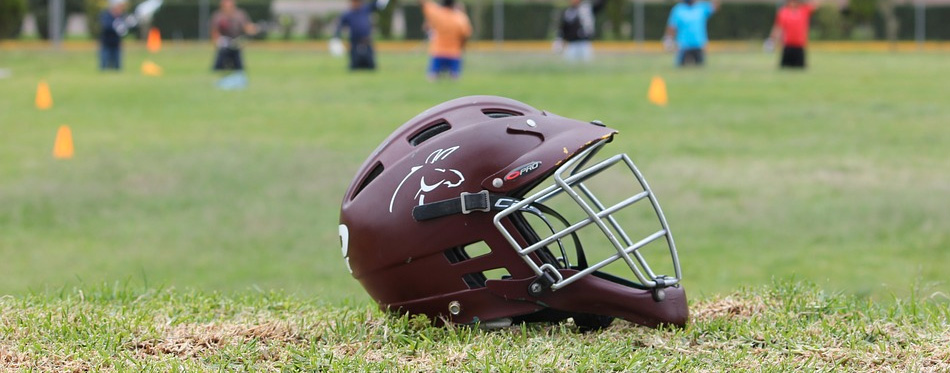 lacrosse helmet on the ground