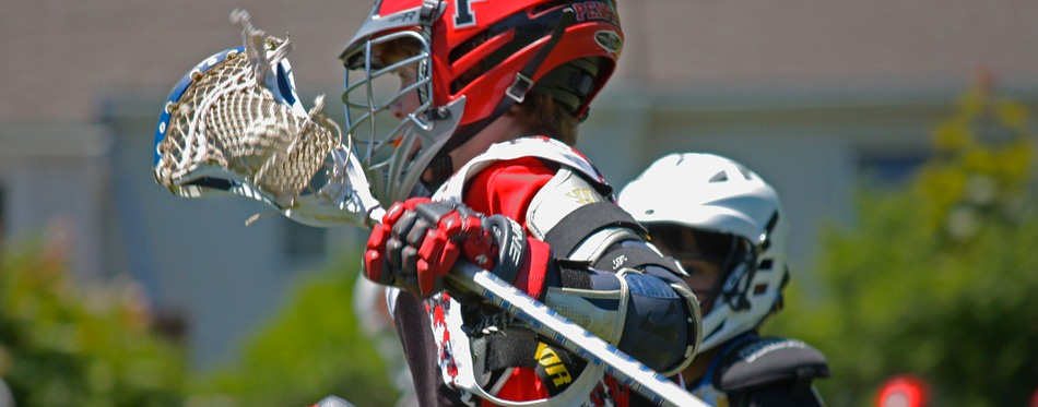 player holding lacrosse stick
