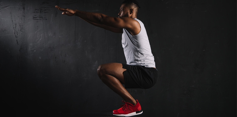 a man doing squats