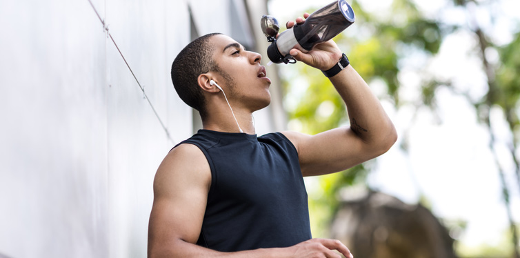athlete drinking water