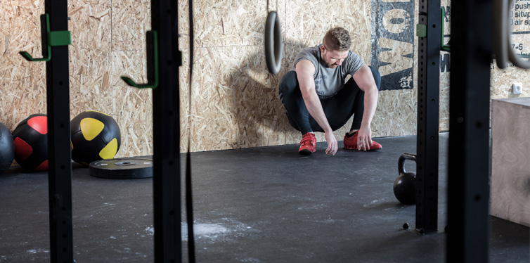 man drained at the gym