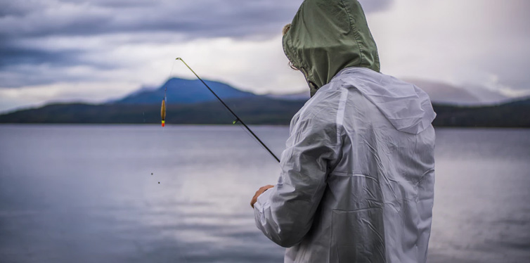 man in a jacket fishing