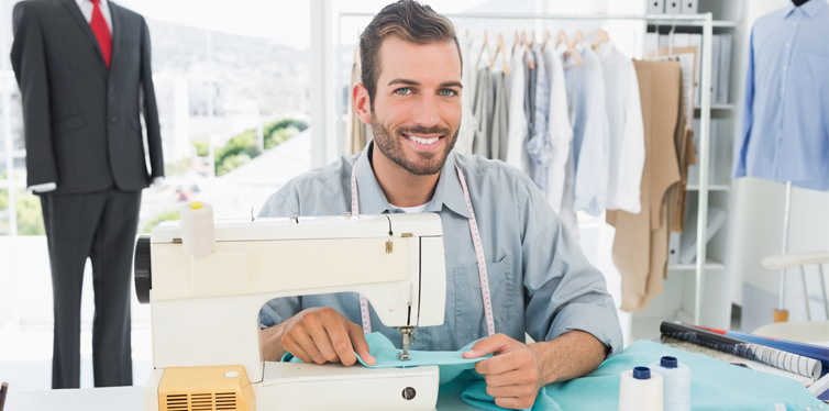 man using a sewing machine