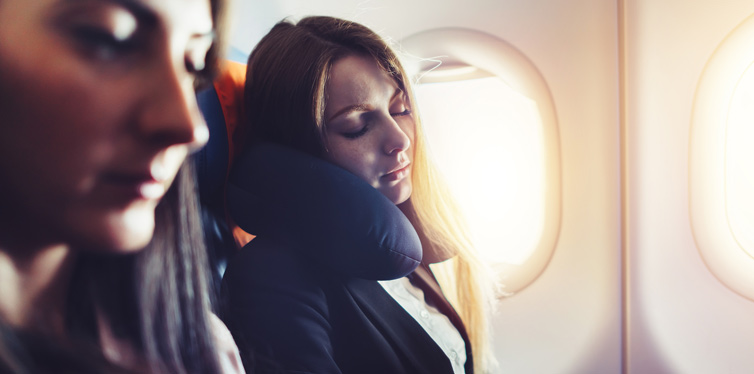woman sleeping with neck pilow
