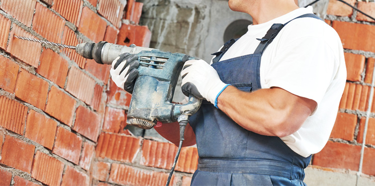 worker with a drill