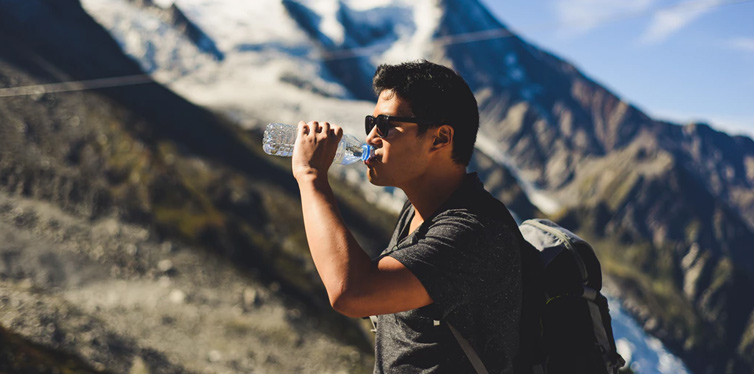 man drinking water