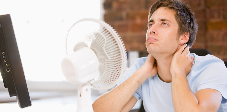 man using a cooling fan