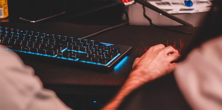 man using mechanical keyboard