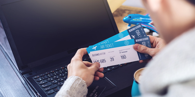 man with plane tickets