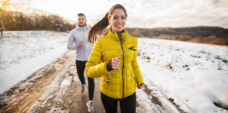 couple running in winter