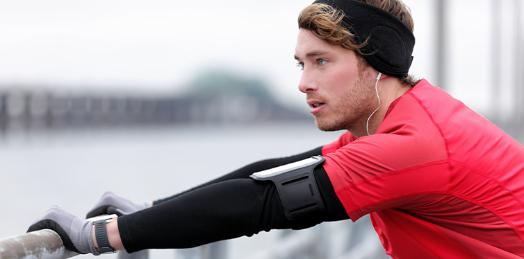 man running in cold winter weather