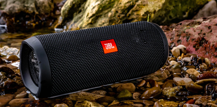 black speaker on the water