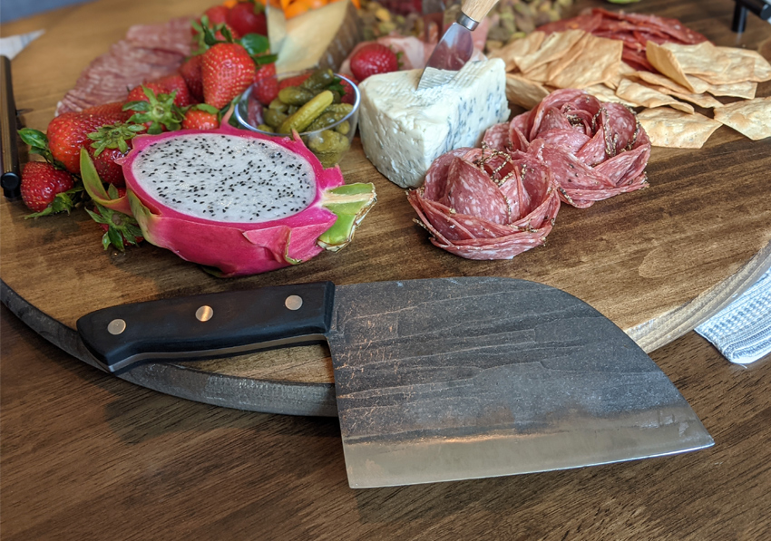 https://www.gearhungry.com/wp-content/uploads/2021/05/deep-cuts-xyj-forging-serbian-chef-knife-1-1.jpg