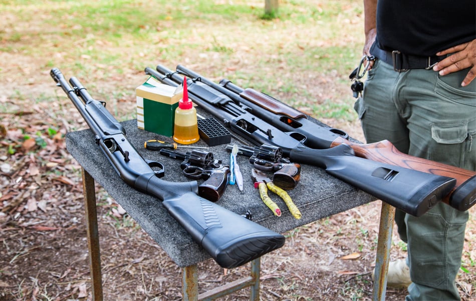 guns and gun maintenance on the table