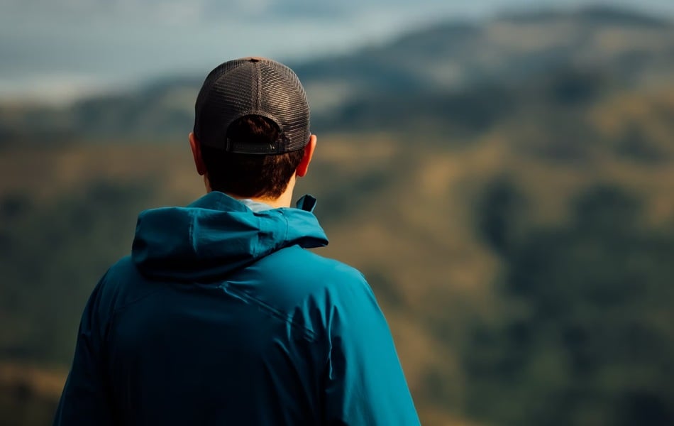 man wearing trucker hat