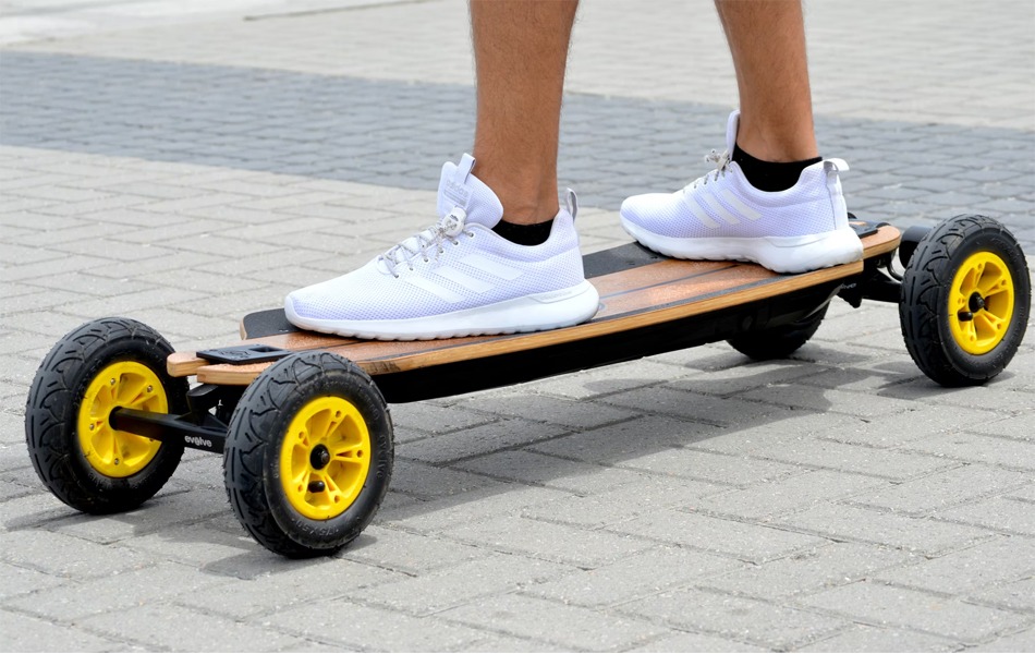 man with electric skateboard
