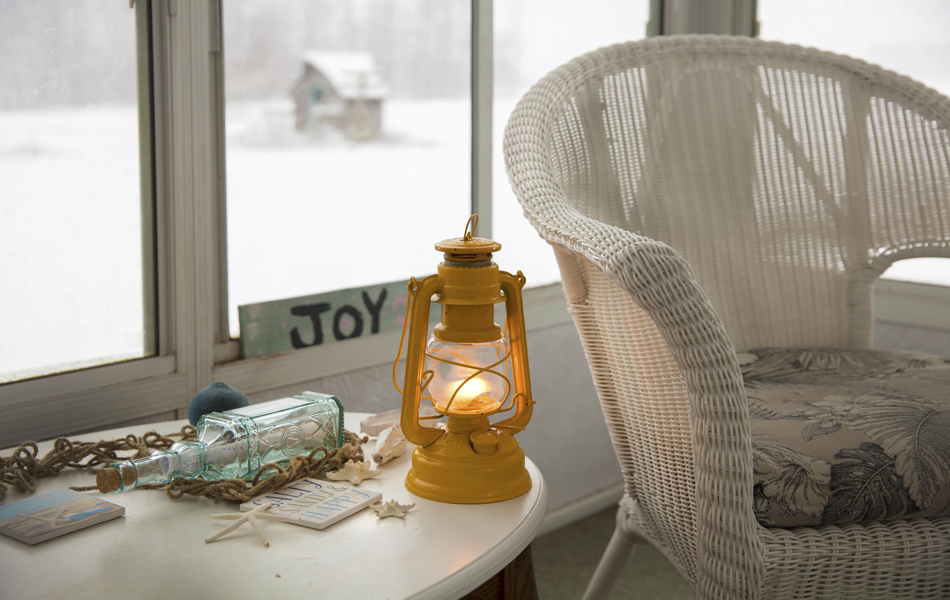 yellow oil lamp on the table