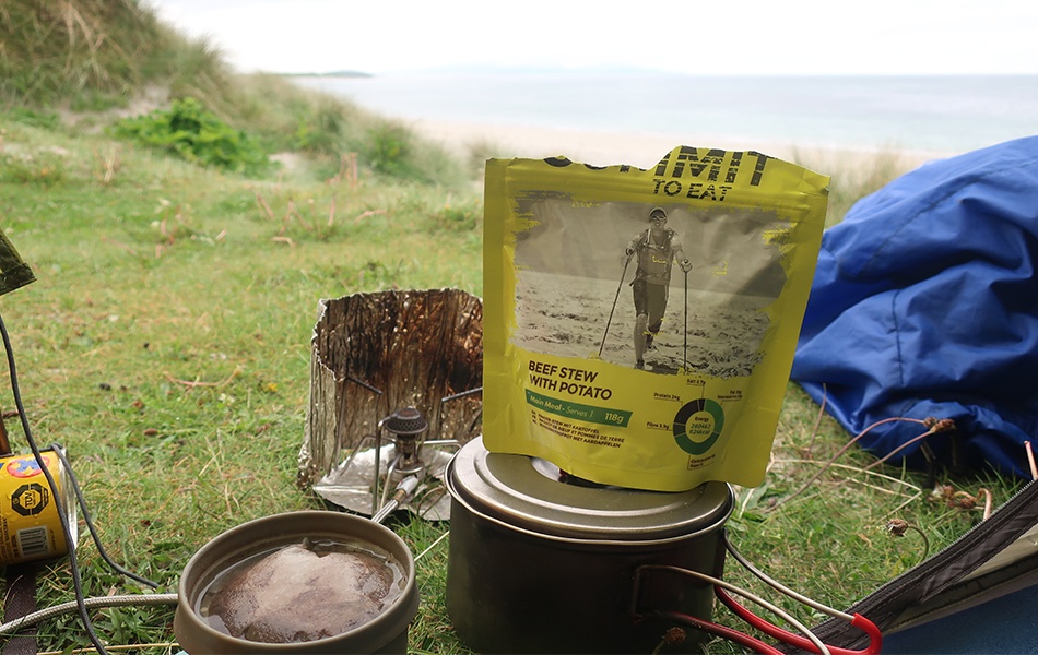 campers making tea and preparing food