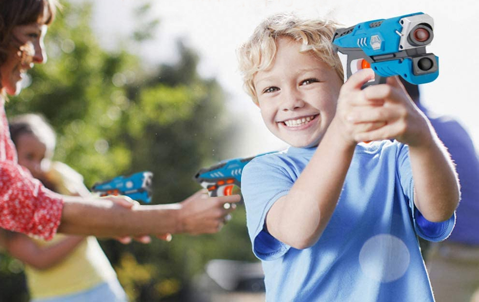 kid playing with laser tag set