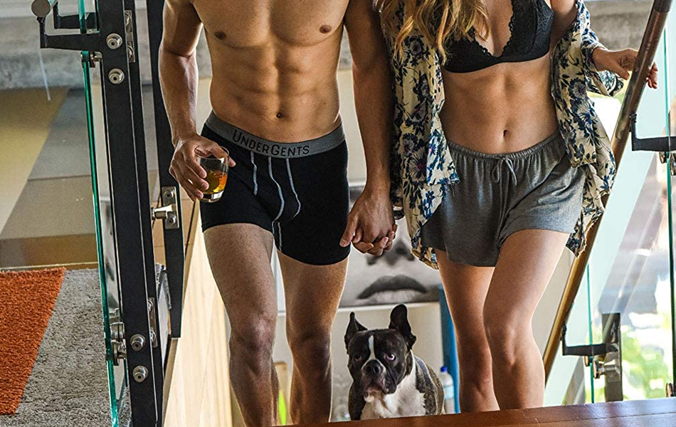 man in workout underwear with his girlfriend