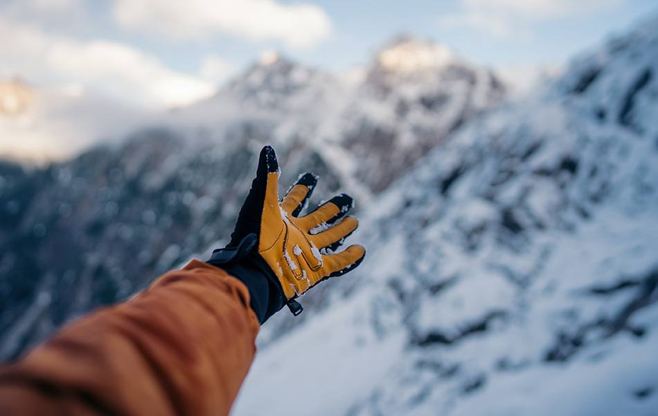 hand winter sport glove on snow
