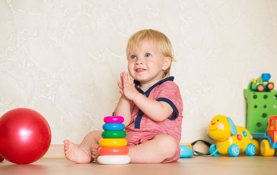 one year-old child playing