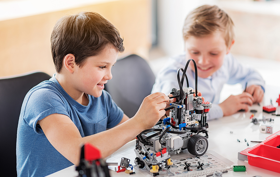 boys having fun in workshop