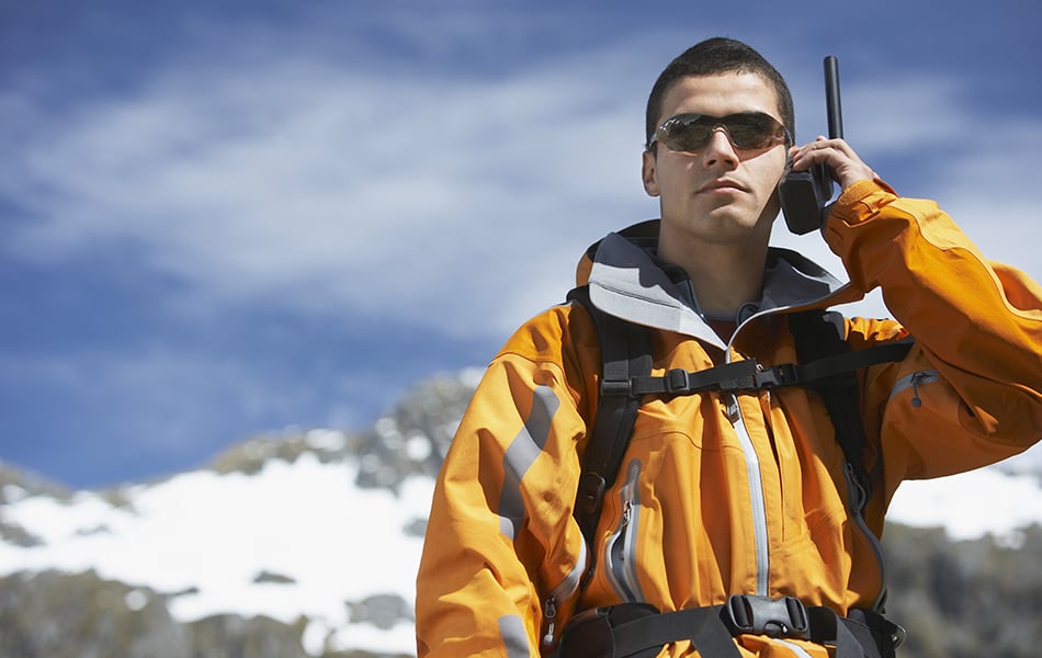 young man using walkie talkie